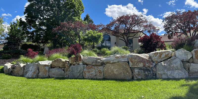 rock retaining wall with beautiful landscape